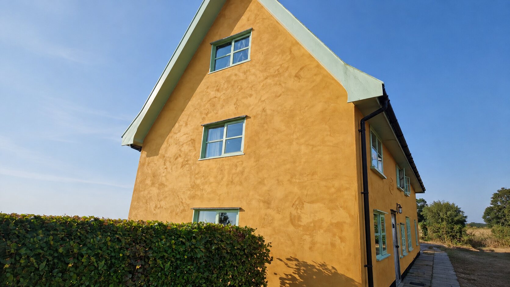 Restored lime render to a timber framed Suffolk home