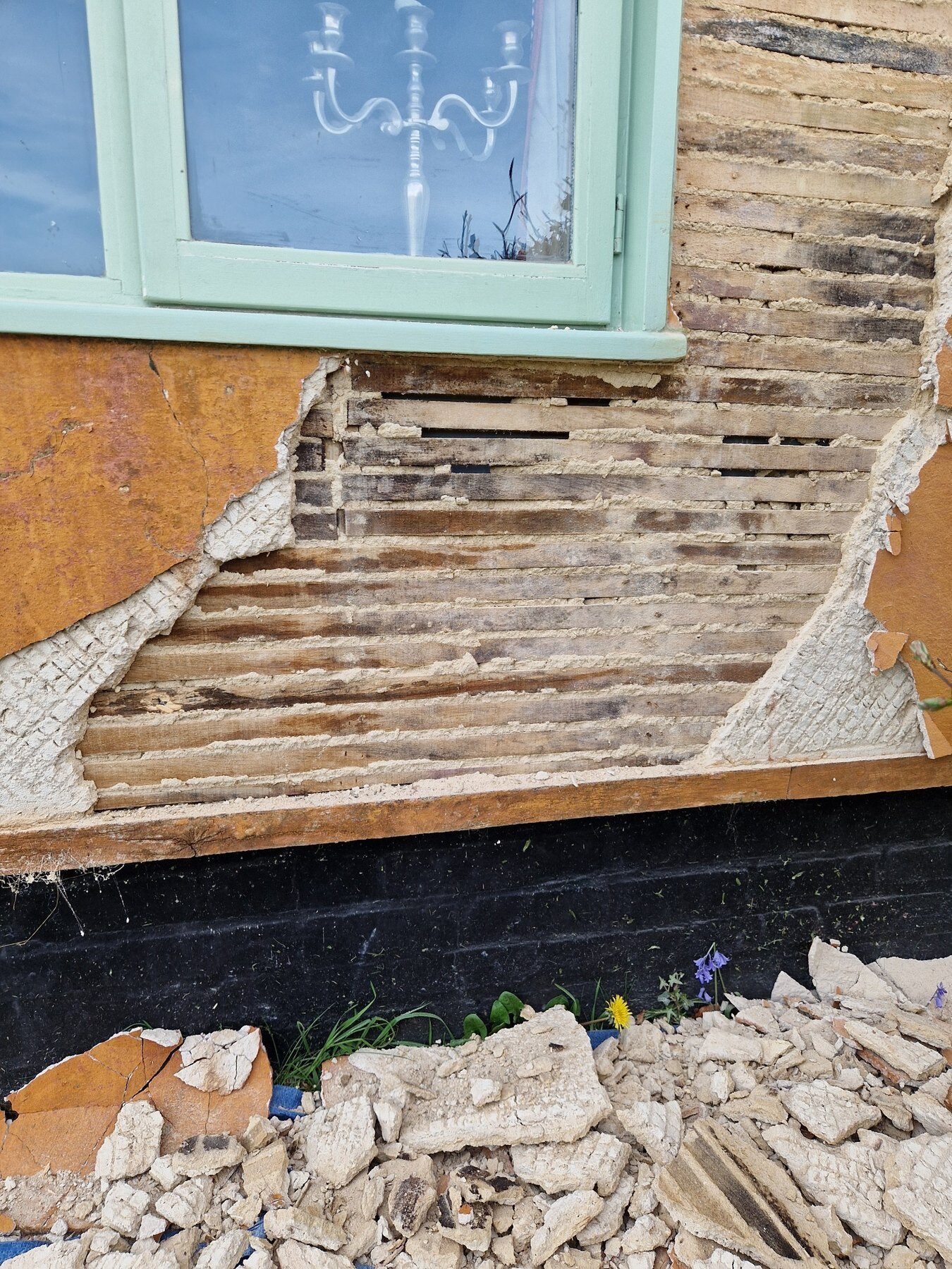 Original timber lath exposed during restoration work
