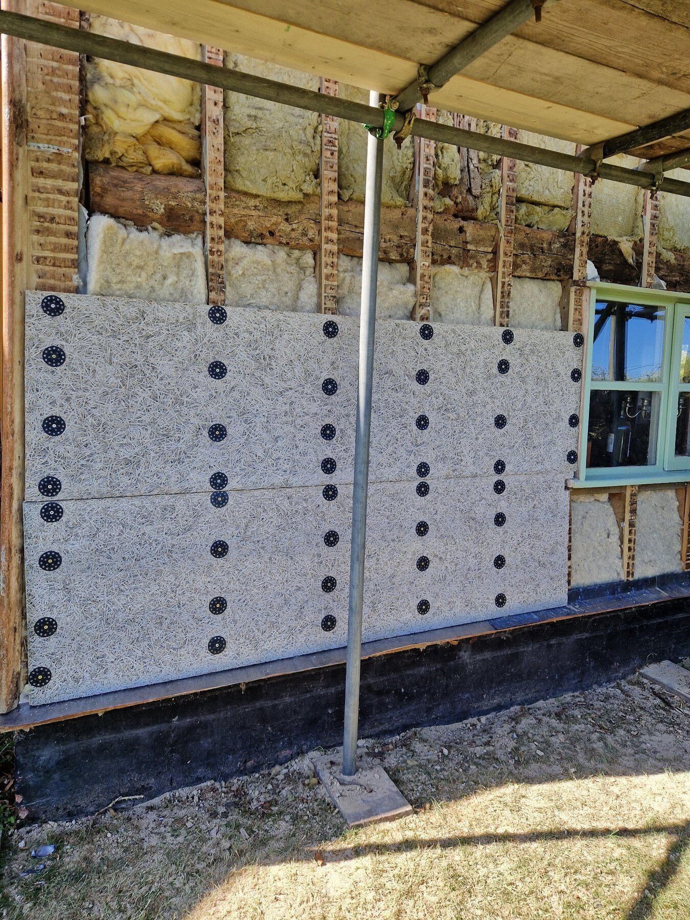 Insulation and timber lath preparation during a lime restoration project
