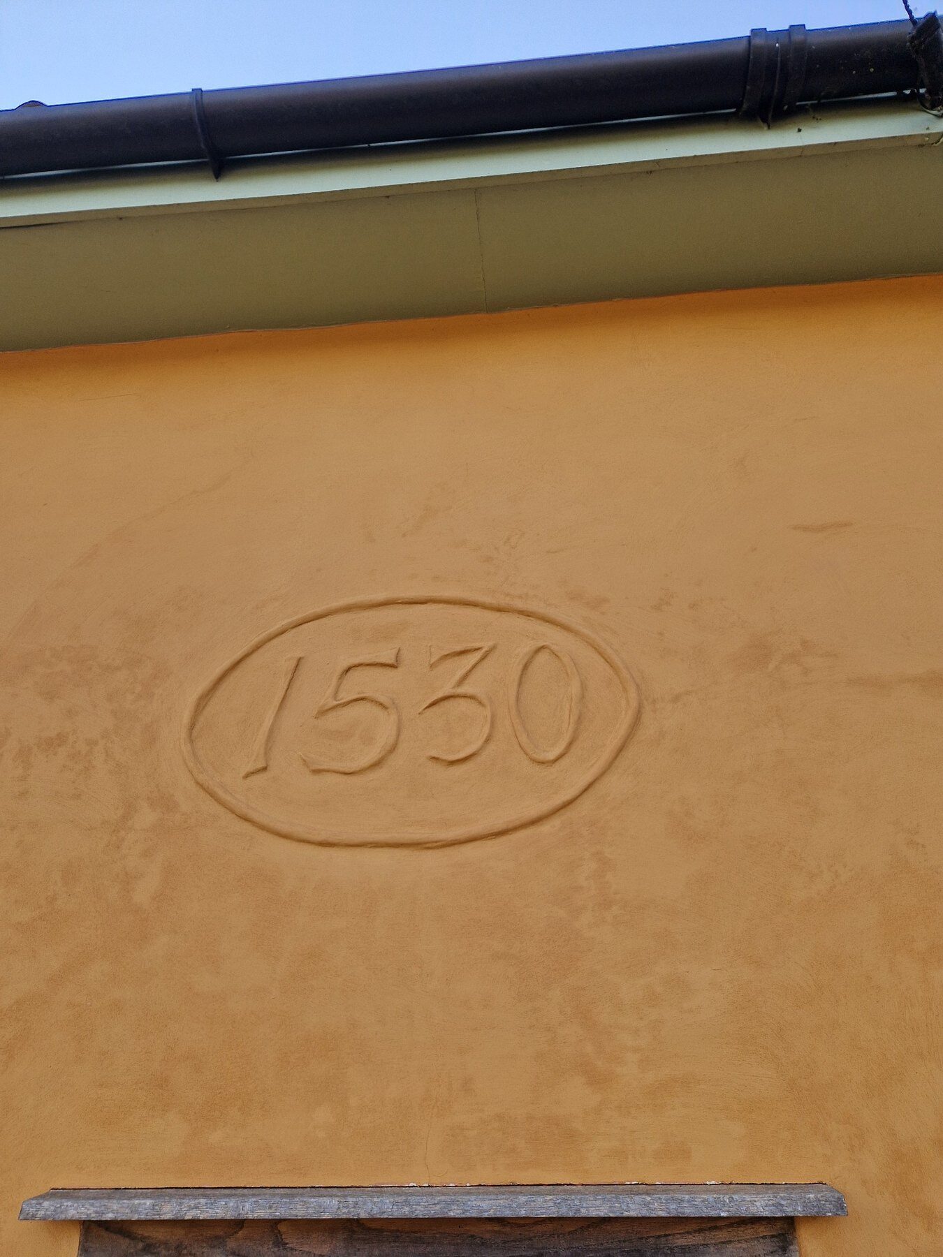 Historic date detail preserved during restoration work