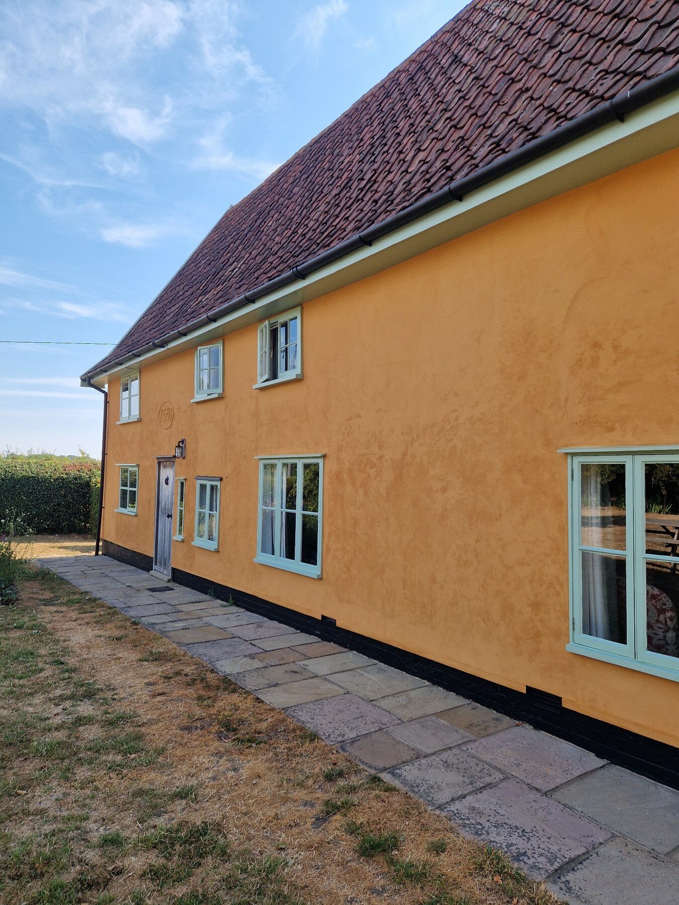 Completed lime rendering on a traditional Suffolk home